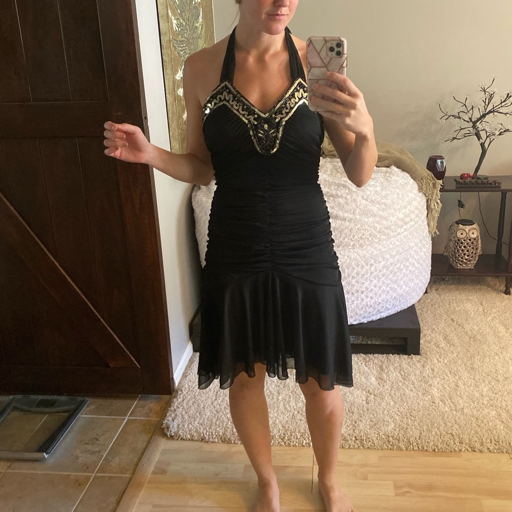 Black mid length dress with gold sequins